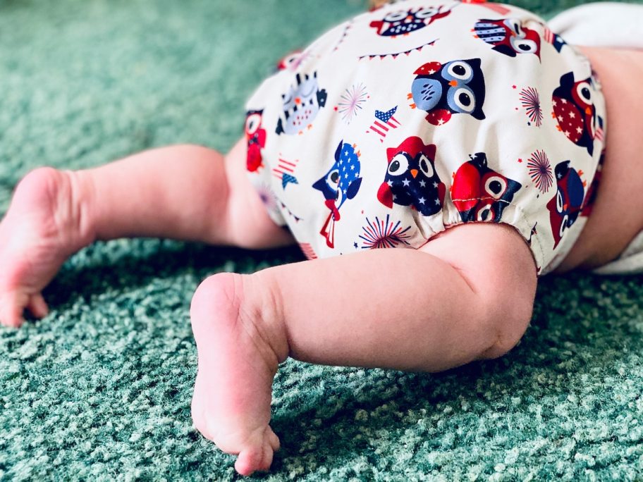 baby wearing owl print on cloth diaper 