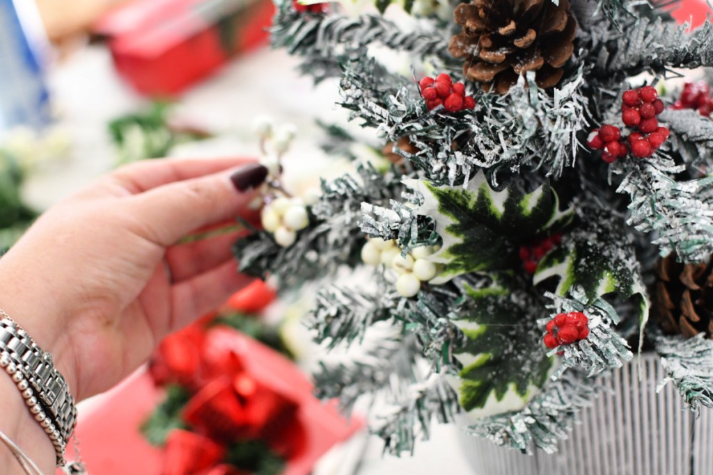 gluing berries to trees