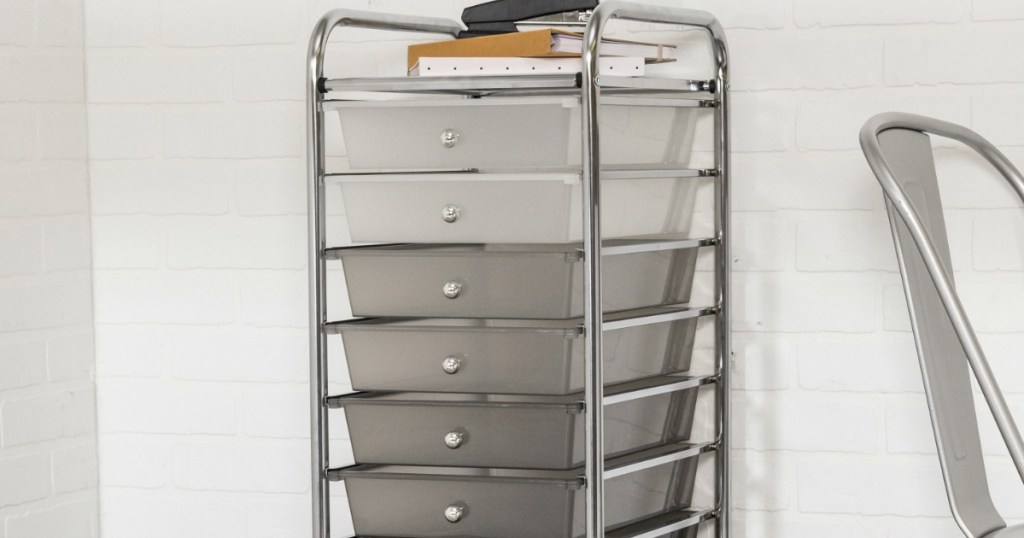 grey cart with office supplies on it