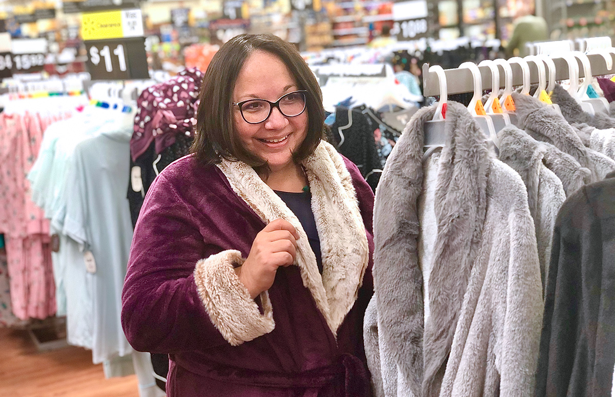 Lina wearing a plush robe in Walmart