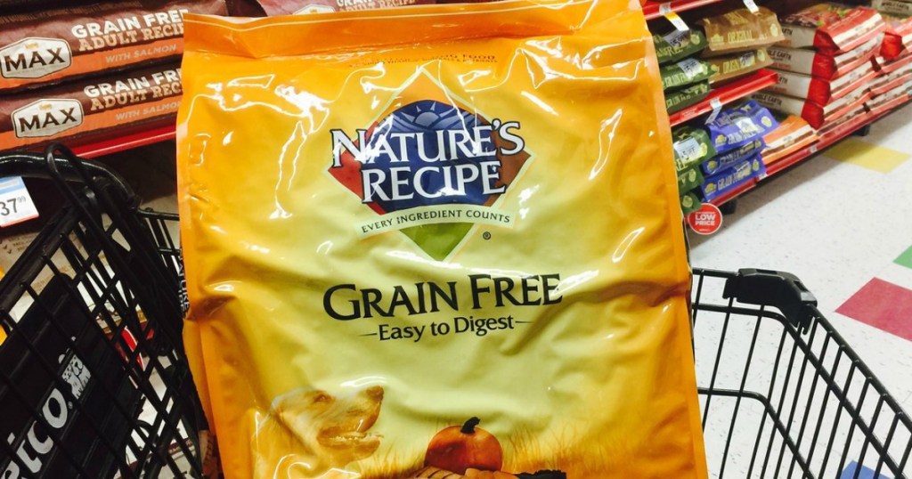 bag of dog food in grocery cart