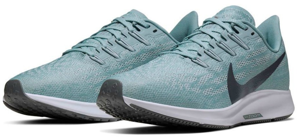 pair of light blue women's shoes on white background