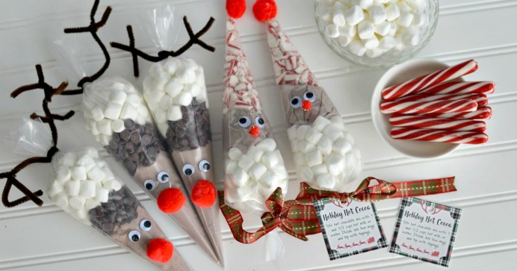 reindeer bags with hot cocoa ingredients inside for frugal christmas traditions neighbor idea