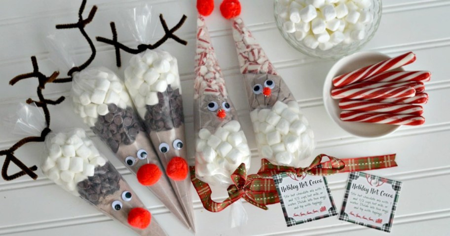 reindeer bags with hot cocoa ingredients inside for frugal christmas traditions neighbor idea