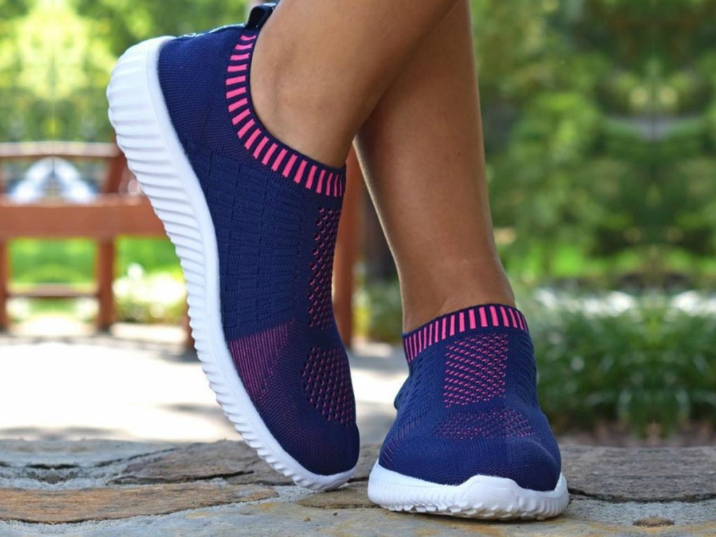 feet with purple shoes on