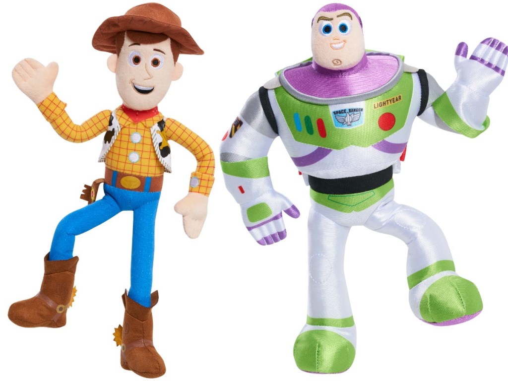 two toys being posed on a white background