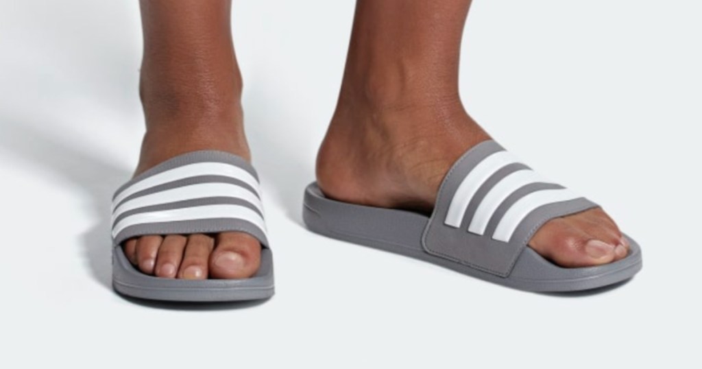 man wearing Men's Adidas Adilette Slide