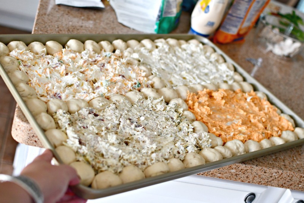 4 dips and pizza balls ready for the oven