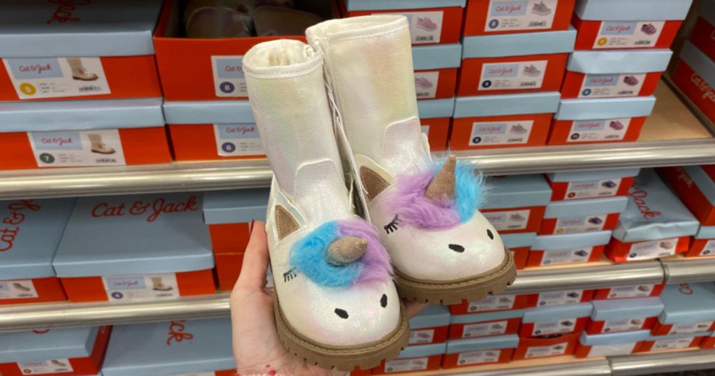 woman holding Cat & Jack Toddler Girls American Girl Hillary Fashion Boots in store