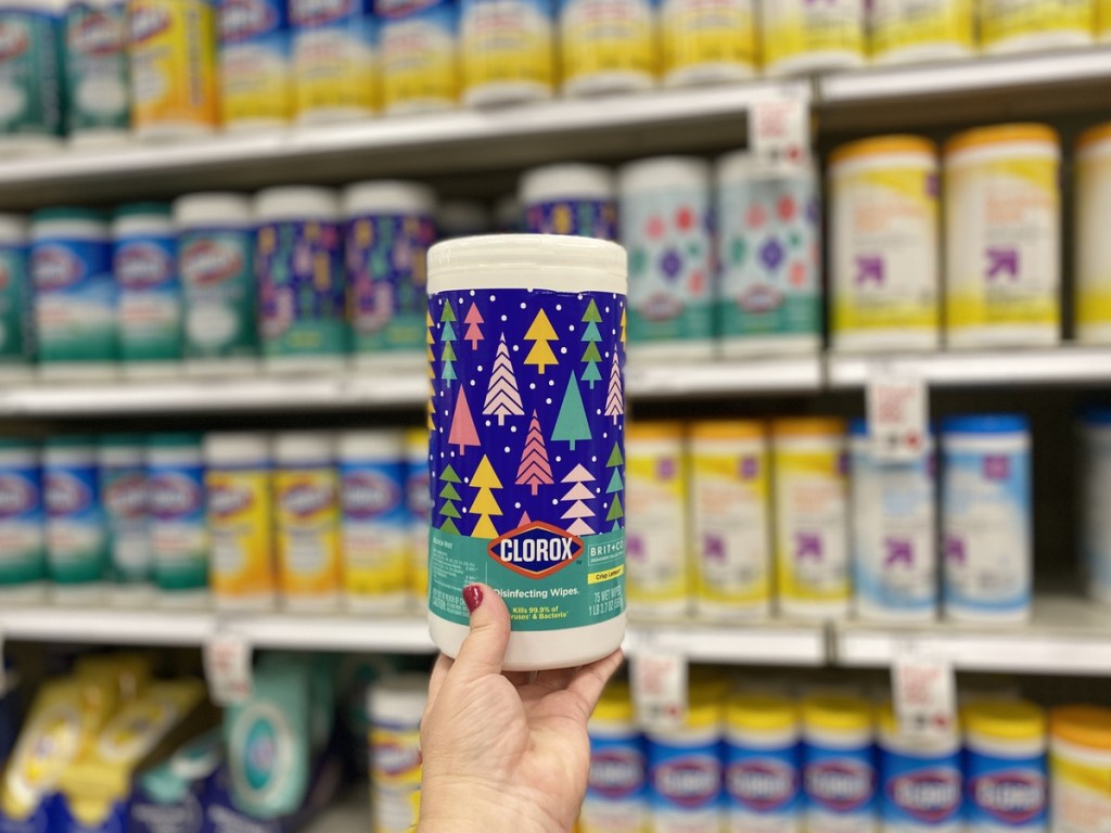 hand holding container of Clorox Holiday Wipes