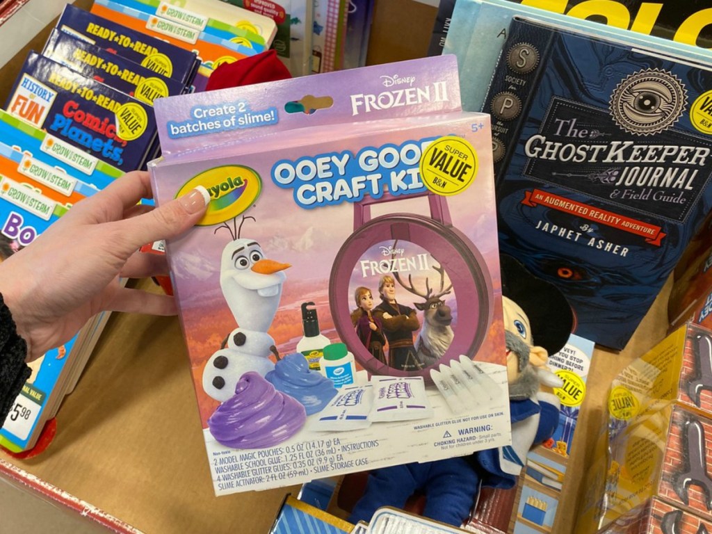 Crayola craft kit in hand at Barnes & Noble