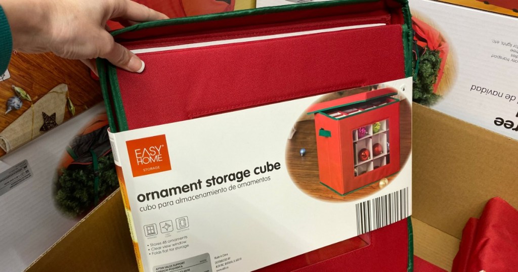 hand holding an Easy Home ornament storage cube