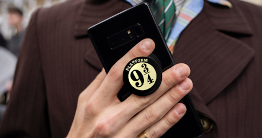 man holding Harry Potter Platform 9 3/4 PopGrip