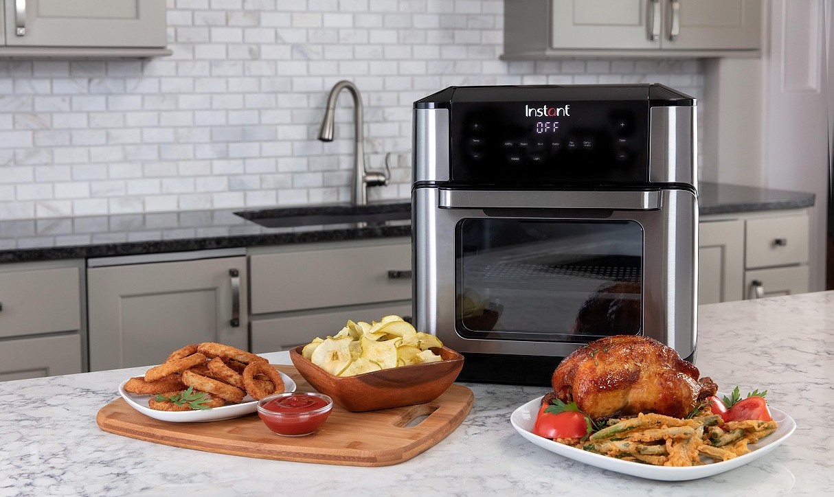 Instant Vortex air fryer with food by it