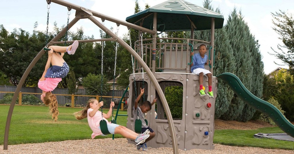 Kids playing on a Lifetime Adventure Tower Playset 