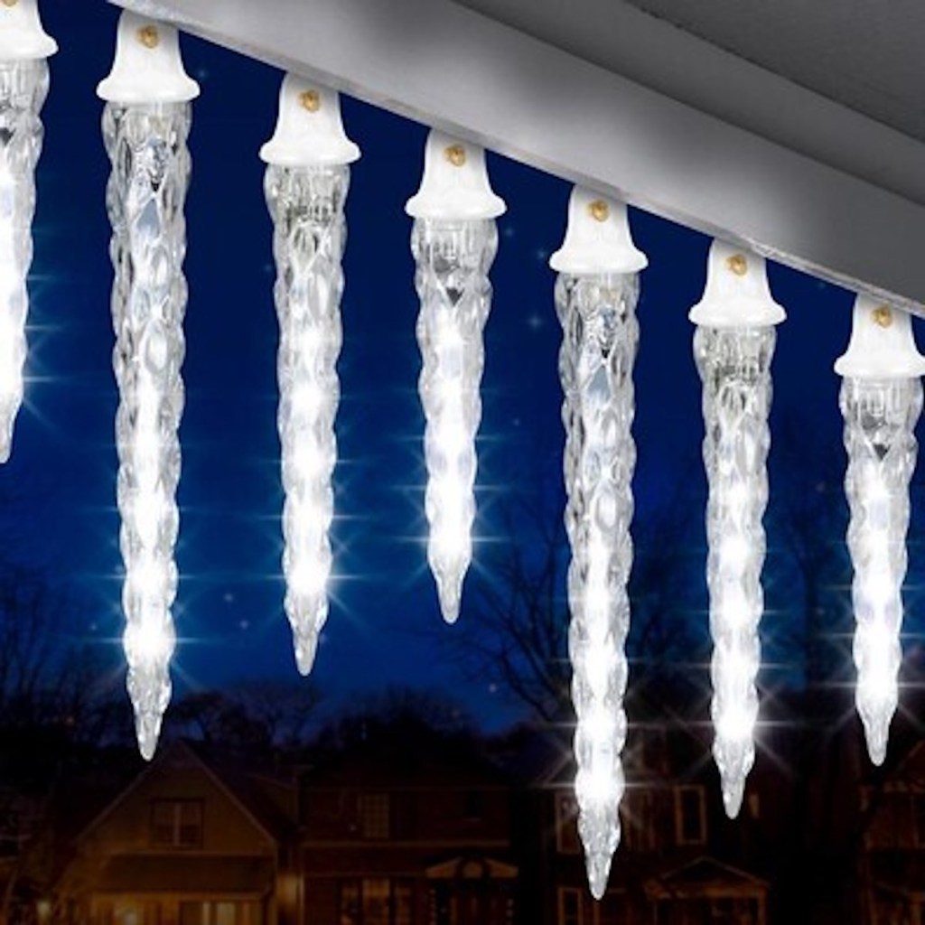 LightShow Shooting Star White LED Plug-In Christmas Icicle Lights handing up on house