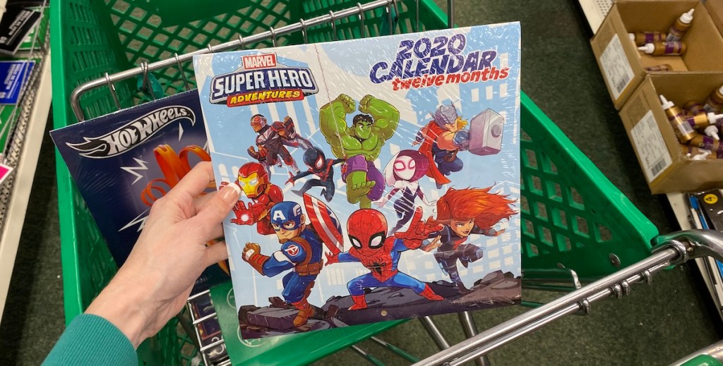 hand holding a Marvel Superheroes Calendar