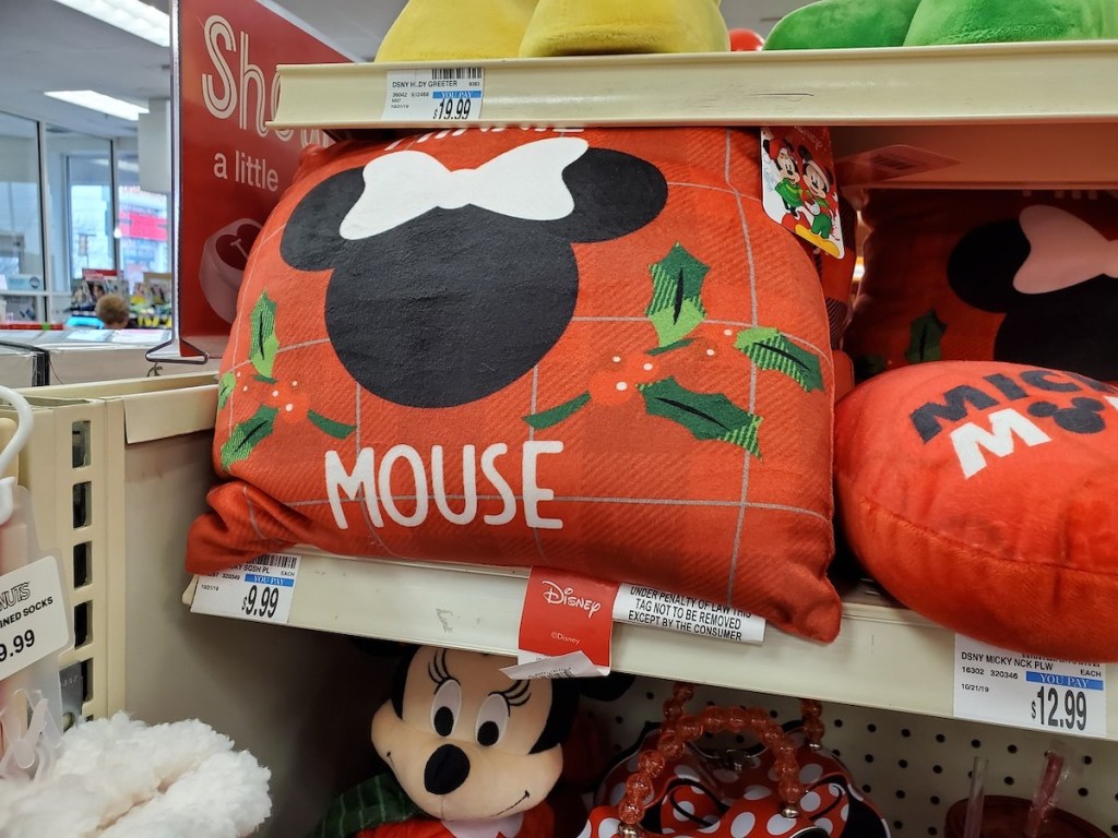 CVS shelf with Minnie Mouse Christmas Pillow