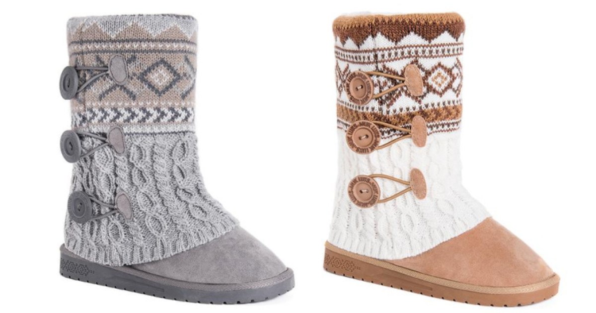 two muk luks boots stock images