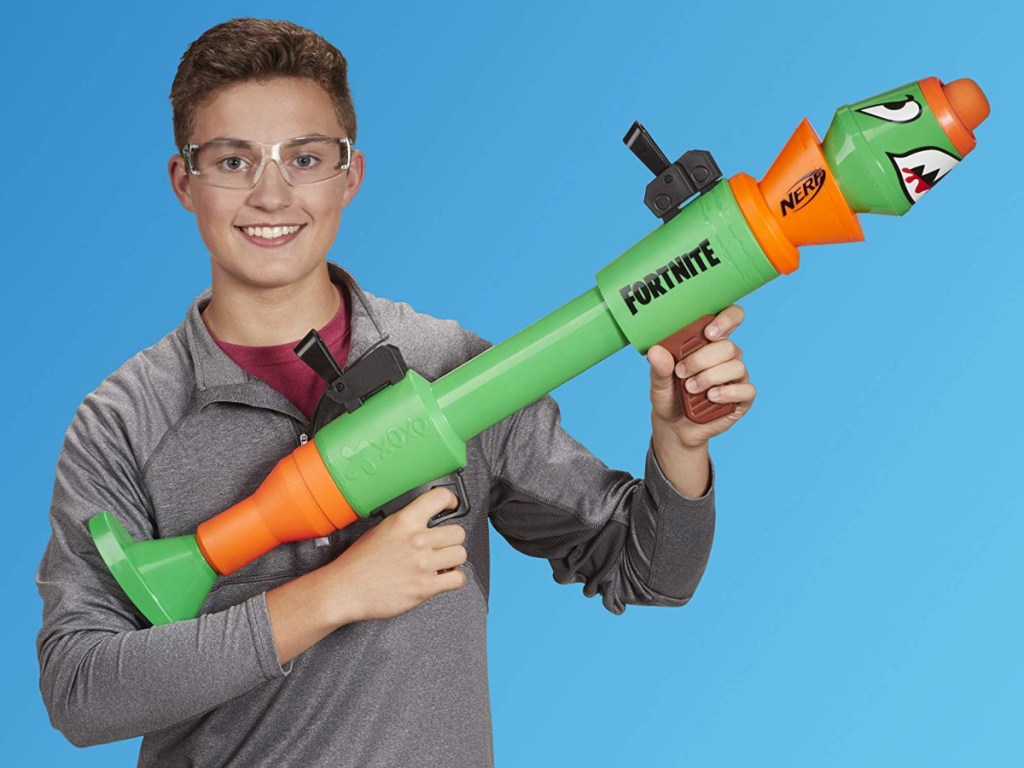 boy playing with nerf fortnite blaster 