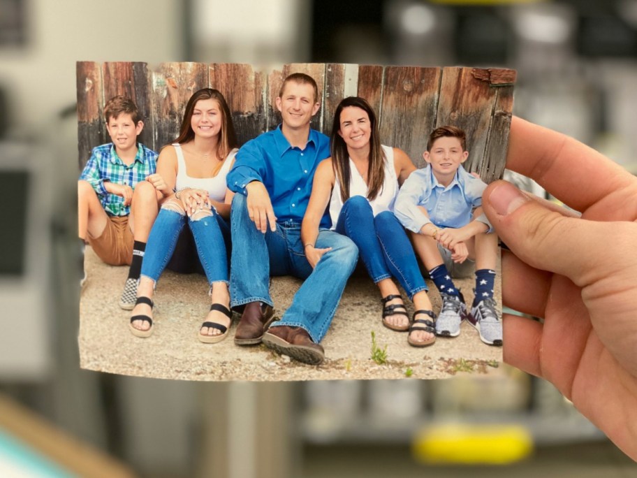 Person holding photo print