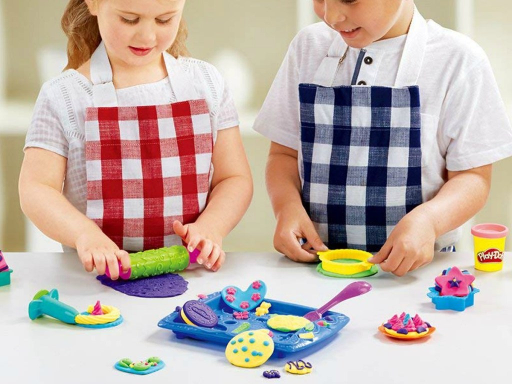 Kids playing with Play-Doh Sweet Shoppe Cookie Creations