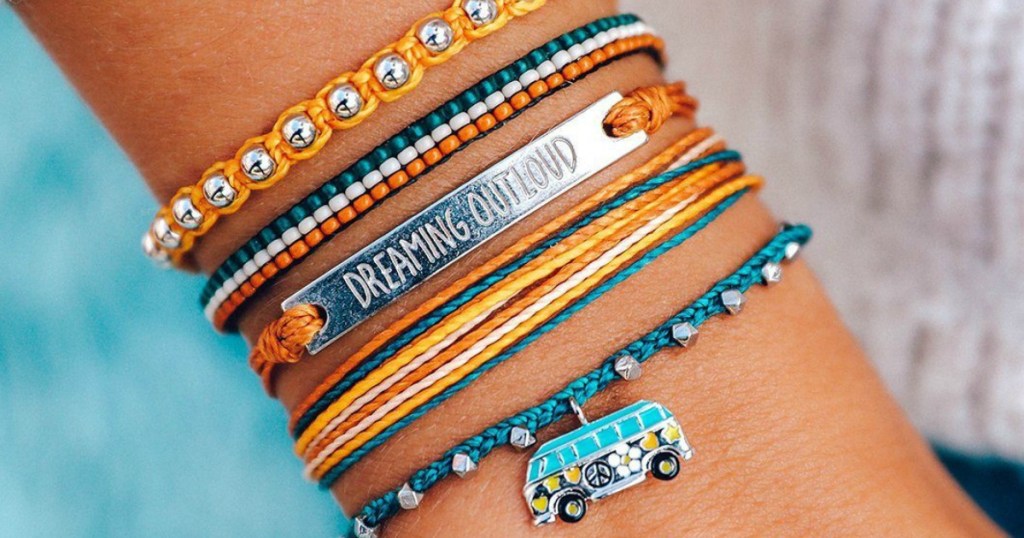 person wearing Pura Vida bracelets