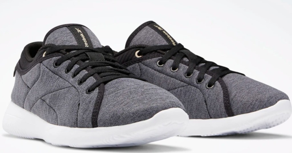 gray Reebok shoes with black trim