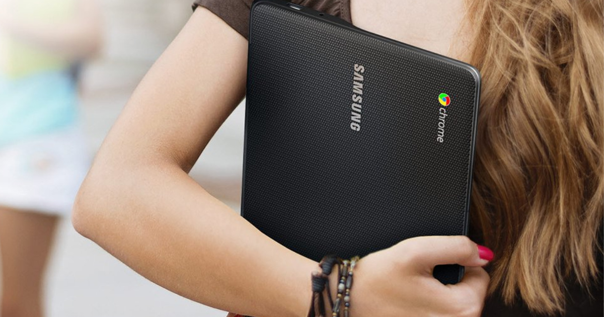 woman holding samsung 11.6" chromebook