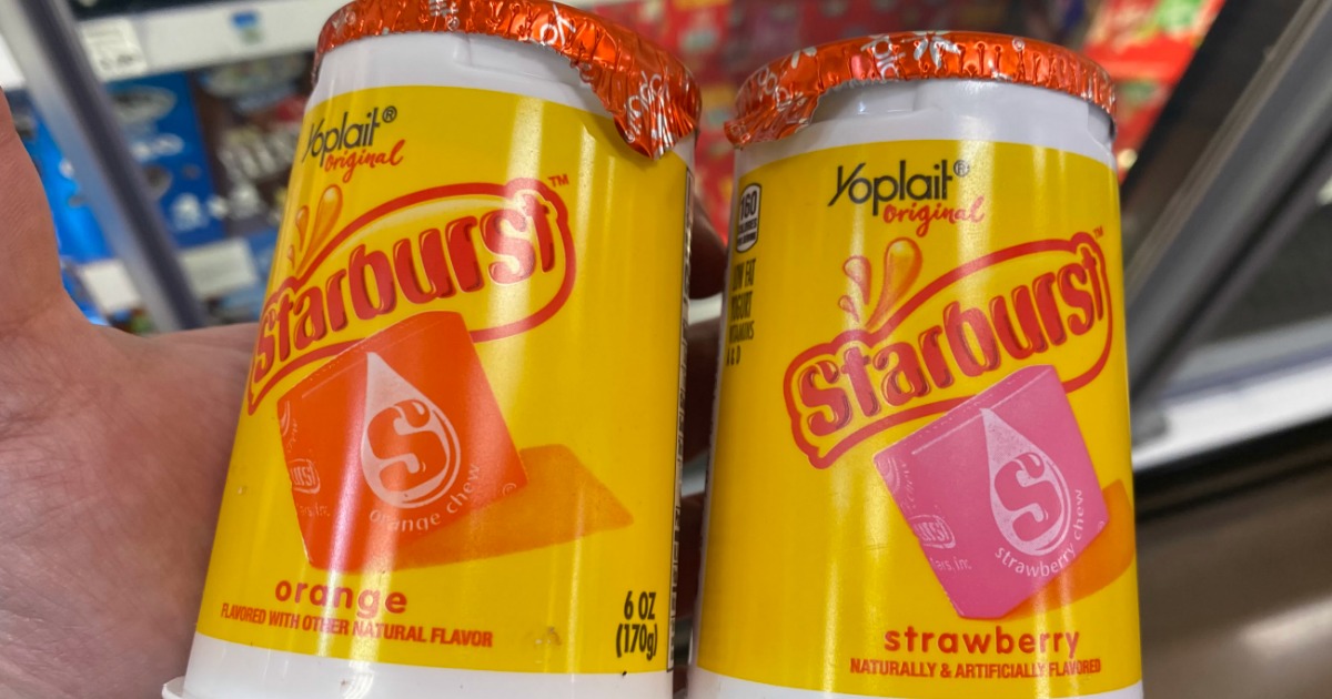 hand holding Starburst Yoplait Yogurts