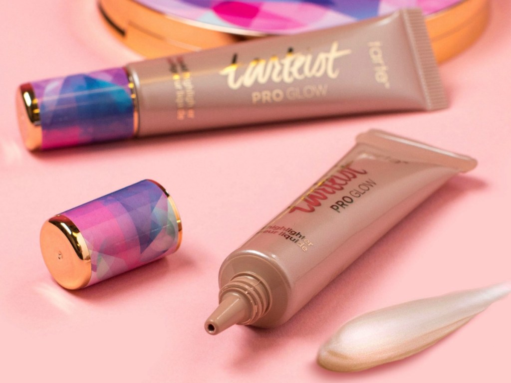 Tarte cosmetics brand liquid highlighter near container