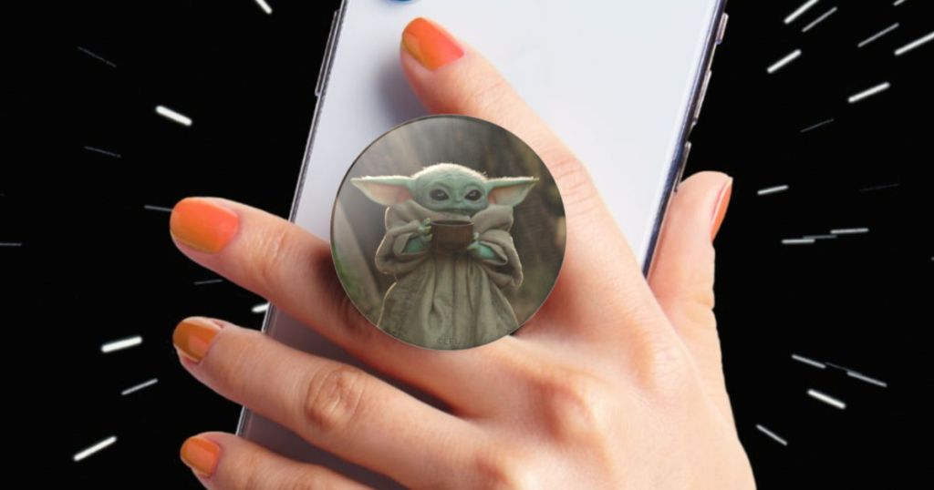 woman hand holding The Child Cup PopCulture PopGrip on white phone