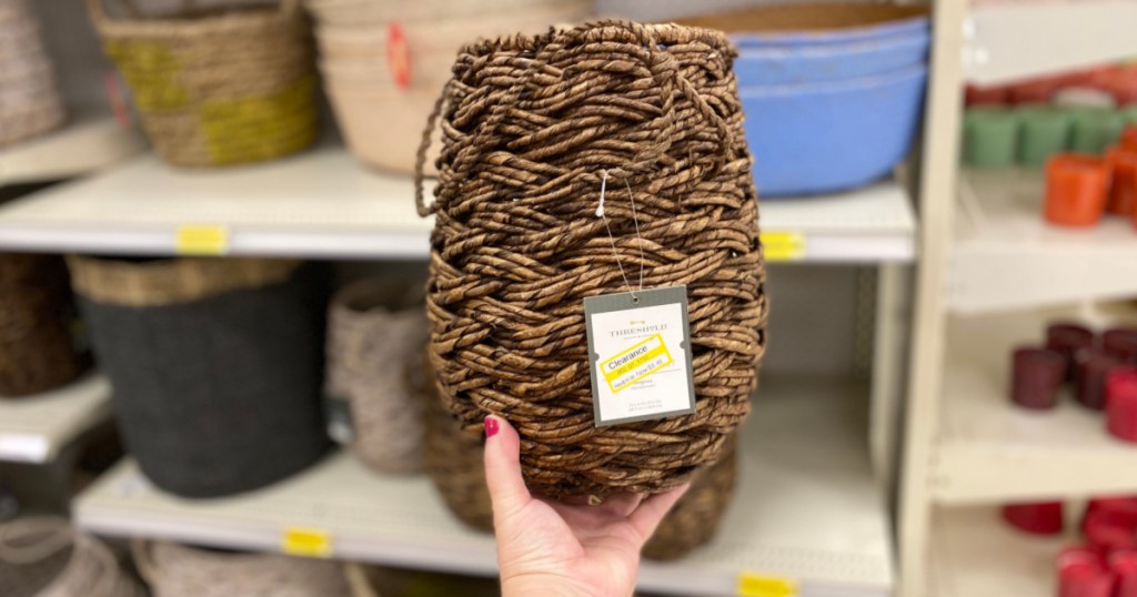 hand holding basket in a store