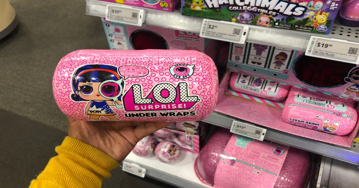 L.O.L. Surprise Under Wraps Blind Box. Hand holding the blind box in store