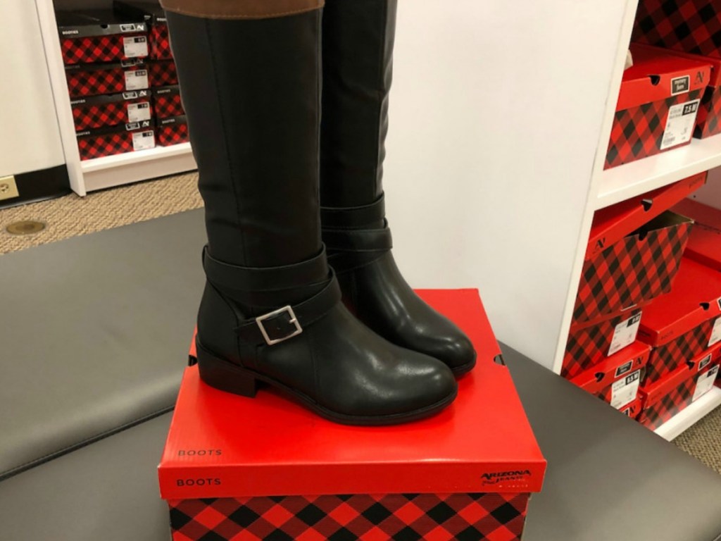 women's boots on box in store