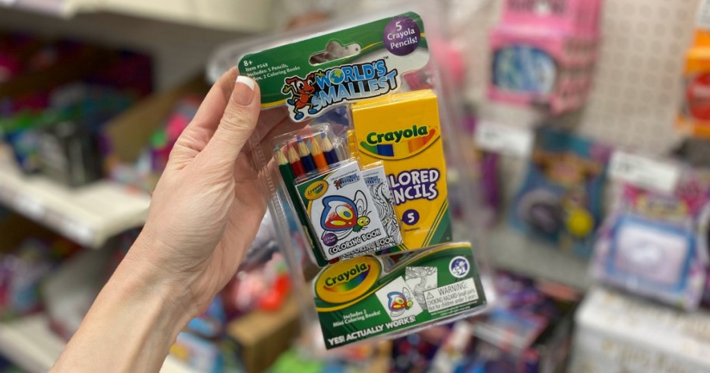 hand holding a World's Smallest Crayola Set