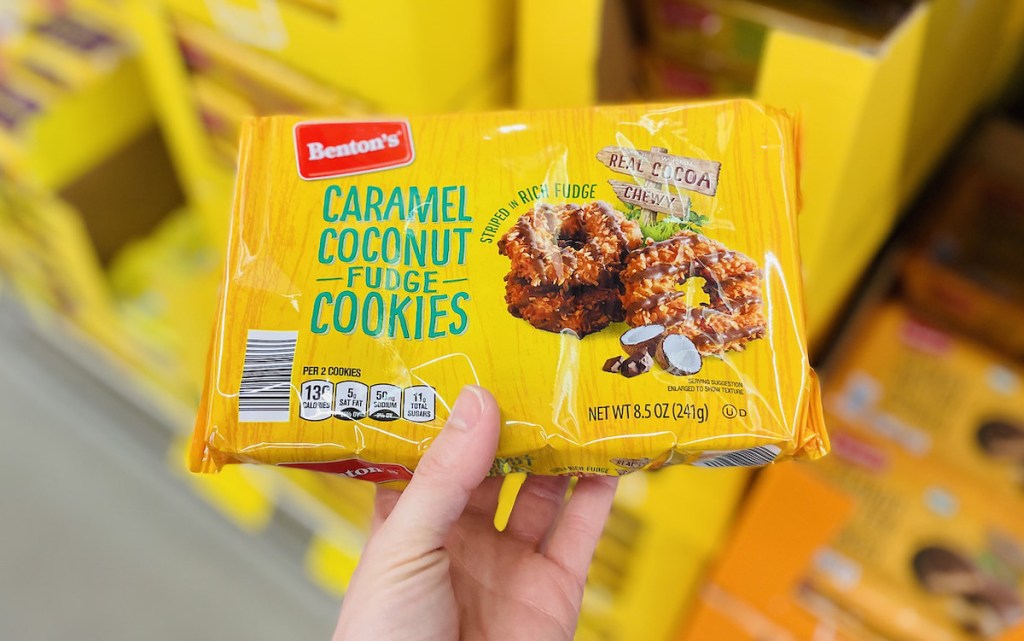 hand holding box of aldi bentons caramel coconut fudge cookies