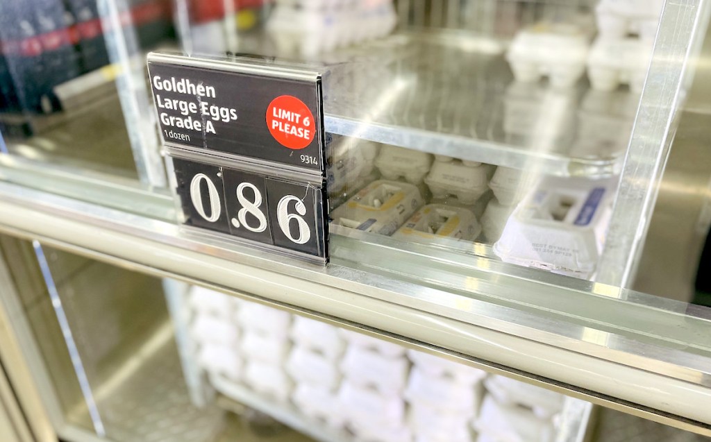 refrigerator door with price on glass door for eggs