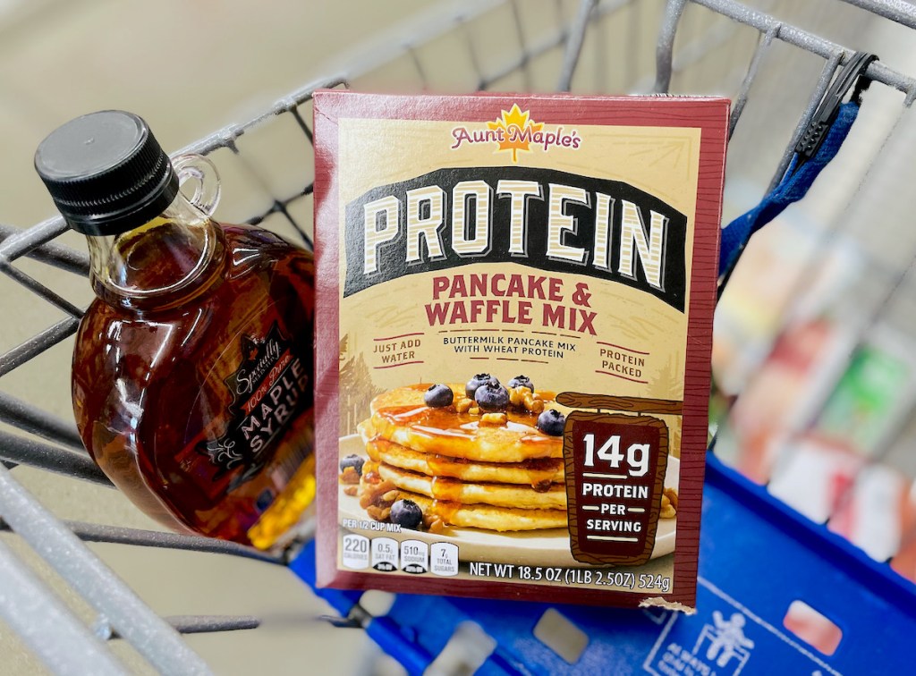 box of pancake mix and maple syrup in aldi cart