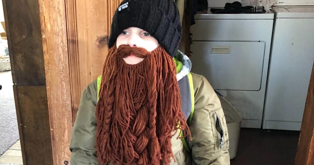 boy wearing beard hat and jacket 