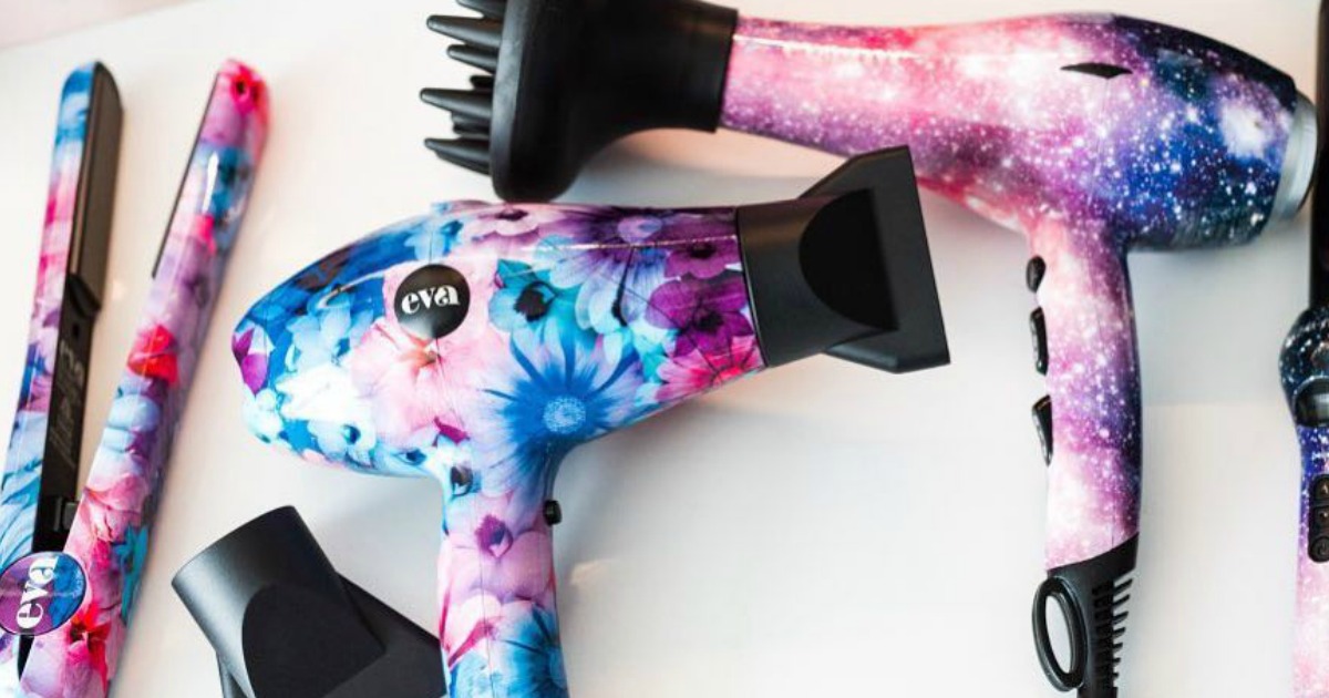 blow driers and hair straightener on table