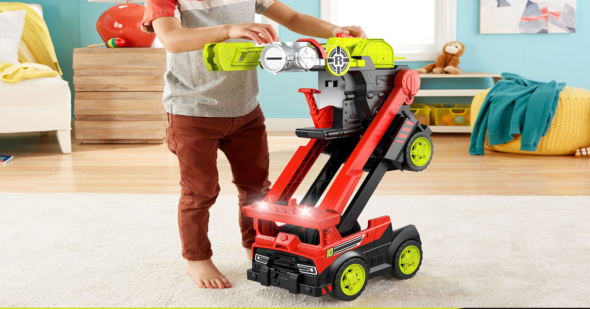 boy playing with Rescue Heroes Transforming Fire Truck with Lights & Sounds
