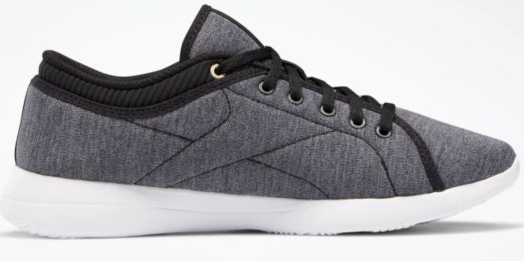 gray shoes with black laces and white soles