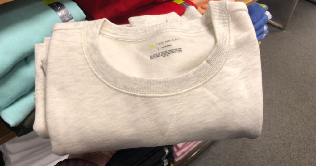 hand holding white tek gear womens fleece