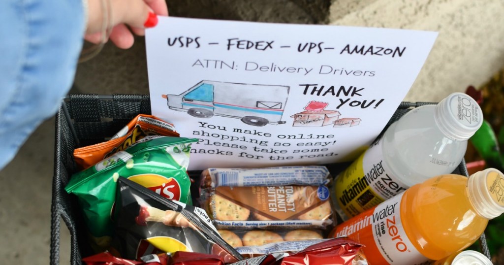 adding note to basket of snacks for delivery drivers