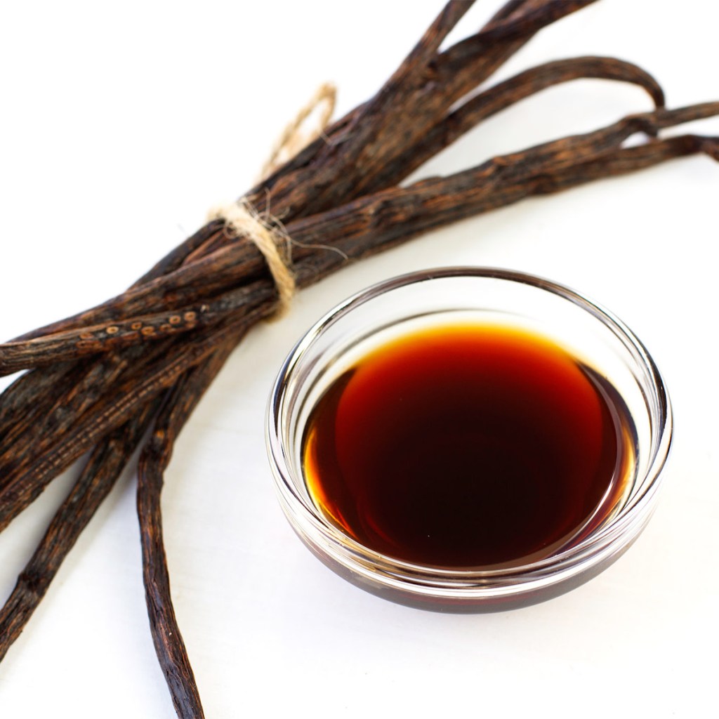vanilla beans and with cup of vanilla extract