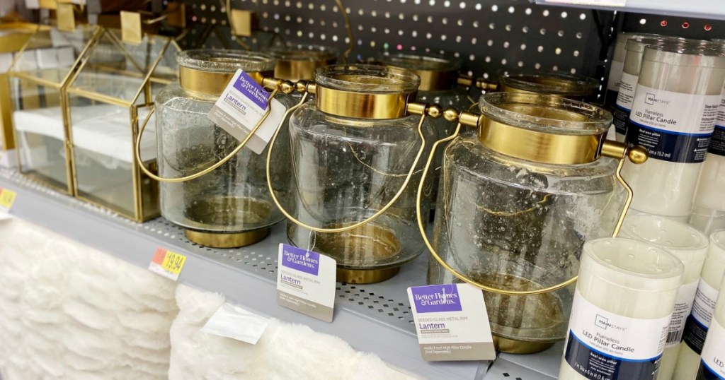 Better Homes & Gardens gold lanterns on shelf at Walmart