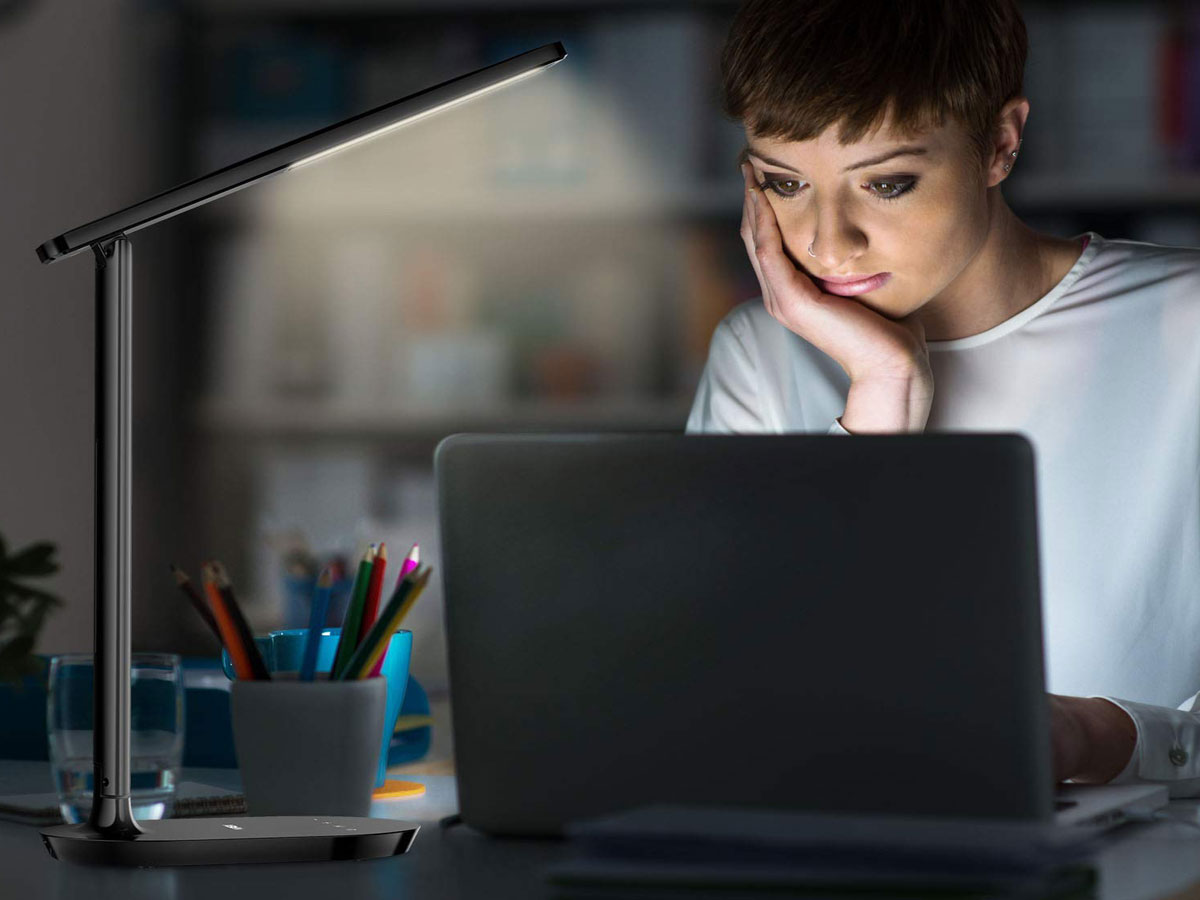 woman looking at laptop