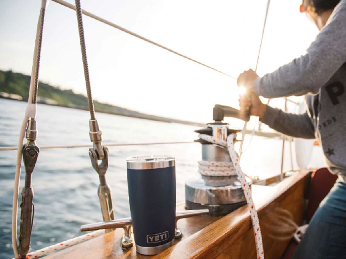 picture of a yacht on water with a YETI 20oz Rambler Tumbler with MagSlider Lid