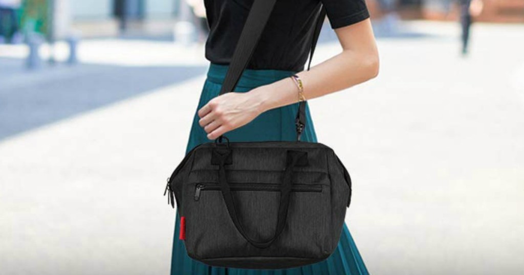 lady carrying a lunch bag